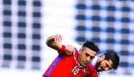Al Shahaniyah's Rahim Abbas Mehdi (left) vies for the ball possession with an Al Wakrah player during their Qatar Stars League match which ended in a two-all draw at Al Wakrah Stadium yesterday.