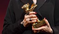 Costume designer Milena Canonero accepts an Honorary Golden Bear for her lifetime achievement at the 67th Berlinale International Film Festival in Berlin, February 16, 2017. REUTERS/Jens Kalaene/POOL
