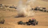 Smoke rises after a rocket landed in the middle of the Iraqi rapid response forces' position during a battle against Islamic State militants in the south of Mosul, Iraq February 19, 2017. REUTERS/Zohra Bensemra
