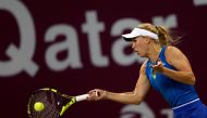 Caroline Wozniacki of Denmark in action against Monica Puig of Puerto Rico in their Qatar Total Open women's singles semi final match at Khalifa International Tennis and Squash Complex in Doha, Qatar on February 17, 2017. Mohamed Farag - Anadolu Agency 