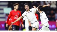 Al Sadd's Bagdad Bounedjah (centre) celebrates after scoring one of his three goals during El Clasico against Al Rayyan at Jassim Bin Hamad Stadium in this December 2016 file photo.