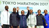 (From left) Kenya's Wilson Kipsang  and Dickson Chumba and Ethiopia's Tsegaye Kebede, Amane Beriso, Amane Gobena and Birhane Dibaba pose for a photograph during a joint press conference for this weekend's Tokyo marathon in Tokyo, Japan  yesterday. The ann