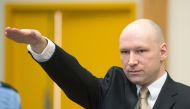 (FILES) This file photo taken on March 15, 2016 shows Norwegian mass killer Anders Behring Breivik making a Nazi salute as he arrives to a makeshift court in Skien prison's gym in Skien, some 130 km south west of Oslo, for his lawsuit against the Norwegia