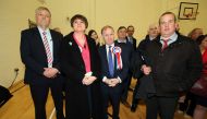 Arlene Foster (2L) stands with Party Chairman Maurice Morrow, Baron Morrow (3L), who lost his seat in the Northern Ireland Assembly elections, at the count centre in Omagh, Co Tyrone, Northern Ireland, on March 3, 2017. AFP / Paul Faith