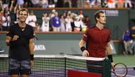 Vasek Pospisil of Canada celebrates after his straight sets victory against Andy Murray of Great Britain in their second round match during day six of the BNP Paribas Open at Indian Wells Tennis Garden on March 11, 2017 in Indian Wells, California. Clive 