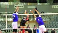 Action during the 36th GCC Club Volleyball Championship match between Al Rayyan and Dar Kulaib (Bahrain) at Ali bin Hamad SC Al Attiyah Arena yesterday. Pics: Abdul Basit/The Peninsula