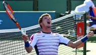 Pablo Carreno Busta of Spain celebrates hi match point as he defeated Pablo Cuevas in his quarter final match in the BNP Paribas Open at the Indian Wells Tennis Garden on Thursday.