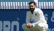 India's captain Virat Kohli reacts after he was injured while fielding during the first day of the third Test cricket match between India and Australia at The Jharkhand State Cricket Association (JSCA) Stadium Complex in Ranchi on March 16, 2017. (AFP / S