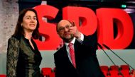 Former European parliament president and candidate for Chancellor of Germany's social democratic (SPD) party Martin Schulz (R) and Secretary General of the SPD Katarina Barley tour the Arena Berlin, one day ahead of the party congress on March 18, 2017 in