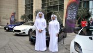 Ahmed Al Obaidli, Director Exhibitions department Qatar tourism authority (left) and Ahmed Al Mulla COO- Entertainment Elan Group posing front of luxury cars after the Press conference of Qatar Motor Show 2017 in Doha Pic: Abdul Basit