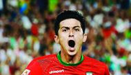Iran’s Sardar Azmoun celebrates after scoring a goal against Qatar at the Stadium Australia in Sydney in this January 2015 file picture.