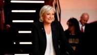 Far-right Front National (FN) party Marine Le Pen waits before taking part in a debate organised by the French private TV channel TF1, between five candidates for the French presidential election, on March 20, 2017 in Aubervilliers, outside Paris. / AFP /