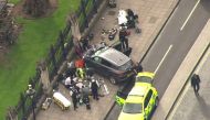 A screengrab taken on March 22, 2017 from footage from an ITN helicopter shows members of the emergency services working at the scene of the terror attack at the Houses of Parliament in central London.  AFP / ITN / HO
