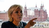French presidential election candidate for the far-right Front National (FN) party Marine Le Pen speaks with the media at Moscow's Hotel National on March 24, 2017. / AFP / Kirill KUDRYAVTSEV
