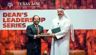 Yasser Al Jaidah, CEO of Qatar Cool, receiving a memento at Texas A&M University at Qatar. 