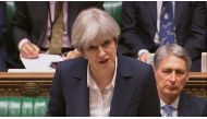 Britain's Prime Minister Theresa May speaks in Parliament as she announces that she has sent the letter to trigger the process of leaving the European Union in London, March 29, 2017.