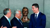 Portuguese footballer Cristiano Ronaldo (right), Portuguese Prime Minister Antonio Costa (centre) and Portuguese President Marcelo Rebelo de Sousa take part in a ceremony where Madeira's airport in Funchal was renamed after Cristiano Ronaldo, on Madeira i