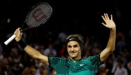 Roger Federer of Switzerland waves to the crowd after his match against Nick Kyrgios of Australia (not pictured) during a men's singles semi-final in the 2017 Miami Open at Brandon Park Tennis Center. Federer won 7-6(9) 6-7(9) 7-6(5). Geoff Burke
