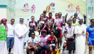 The podium winners at the Ghathra Al Ruwais Point Race pose for a picture in Doha