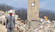 Britain's Prince Charles, Prince of Wales, visits the Italian quake-hit town of Amatrice on April 2, 2017 as part of his European tour aimed at strengthening relations with EU allies post Brexit. / AFP / POOL / ALESSANDRO BIANCHI
