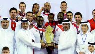 Al Arabi players receiving the Qatar Cup trophy during the presentation ceremony. Al Arabi notched an impressive three sets to one win over Al Rayyan to win the Qatar Cup at the Women’s Sports Committee Hall at Aspire Dome.