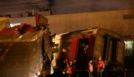 Emergencies Ministry members work at the site of a collision between a passenger train and a suburban train in Moscow, Russia April 9, 2017. Reuters/Maxim Shemetov
