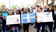 Students and teachers of the Central European University protest in the 1st district of Budapest with their sympathizers on April 9, 2017.  Hungarian lawmakers approved legislation that could force the closure of a prestigious Budapest university founded 