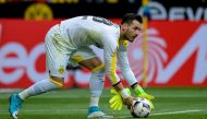 Dortmund's Swiss goalkeeper Roman Buerki plays the ball during the German First division Bundesliga football match between Borussia Dortmund and Eintracht Frankfurt in Dortmund, western Germany, on April 15, 2017.  AFP / SASCHA SCHUERMANN