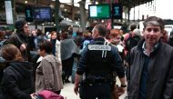 A French policeman patrols inside the Gare du Nord train station in Paris on April 22, 2017, after a man carrying a knife was arrested. (AFP / GEOFFROY VAN DER HASSELT)
