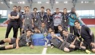 The players of  Amza Ibn Abdulmutalib School, winners of the Aspire Football Festival for Preparatory Schools pose for a picture in Doha yesterday. 