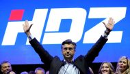 FILE PHOTO: Andrej Plenkovic, president of Croatian Democratic Union (HDZ), waves to his supporters during an election rally in Zagreb, Croatia, September 8, 2016. REUTERS/Antonio Bronic/File PictureRTSRLBI/File Photo