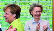 German Chancellor Angela Merkel (left) and Defence Minister Ursula von der Leyen at a CDU board meeting, in Berlin, yesterday.