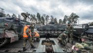 FILE PHOTO: German soldiers load Marder type armored vehicles on a train at the troop exercise area in Grafenwoehr, southern Germany, on February 21, 2017 (AFP / dpa / Armin Weigel) 