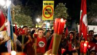 Members of Workers Party (PT) attend a march before former Brazilian President Luiz Inacio Lula da Silva's testimony to federal judge Sergio Moro, in Curitiba, Brazil, May 9, 2017. REUTERS/Rodolfo Buhrer
