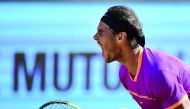 Spain's Rafael Nadal celebrates the last point against Serbian tennis player Novak Djokovic during their ATP Madrid Open semi-final match in Madrid on Saturday. 