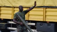 A mutinou soldier patrols in the streets of Ivory Coast's central second city Bouake, in May 14, 2017.  AFP / ISSOUF SANOGO
