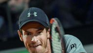 Britain's Andy Murray returns the ball to Italy's Fabio Fognini during their Rome ATP Tennis Open tournament match on Tuesday. Murray was beaten by local favourite Fabio Fognini 6-2, 6-4.
