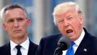 U.S. President Donald Trump (R) speaks beside NATO Secretary General Jens Stoltenberg at the start of the NATO summit at their new headquarters in Brussels, Belgium, May 25, 2017. REUTERS/Christian Hartmann
