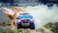Qatar's Nasser Saleh Al Attiyah and his navigator Matthieu Baumel of Toyota Hilux Overdrive team in action during the fifth stage of Rally Kazakhstan yesterday. TOP: Saudi Arabia’s Yazeed Al Rajhi  in action during yesterday's fifth stage.