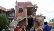  People look at the masjid building under construction after it was demolished by the reason of it being unauthorized in Zemun Polje neighborhood of Belgrade, Serbia on May 26, 2017. (Talha Öztürk / Anadolu Agency)
