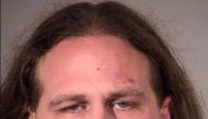This police booking photo obtained May 27, 2017 courtesy of the Portland Police shows suspect Jeremy Joseph Christian, who allegedly stabbed to death two men on a train May 26, 2017 in Portland, Oregon when they tried to help two young women who were bein