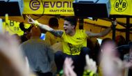 Dortmund's Spanish defender Marc Bartra gestures during celebrations after winning the German Cup final (DFB Pokalfinale) in Dortmund, western Germany, on May 28, 2017. / AFP / Sascha Schuermann
