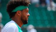 France's Jo-Wilfried Tsonga reacts during his tennis match against Argentina's Renzo Olivo at the Roland Garros 2017 French Open on May 31, 2017 in Paris. / AFP / Eric FEFERBERG