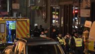 Police and members of the emergency services work at the scene of a terror attack near London Bridge in central London on June 3, 2017. AFP / Chris J Ratcliffe
