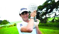 Italy's Renato Paratore poses for photographers with the trophy after winning the Golf Masters 2017 at Barseback Golf Club, yesterday.