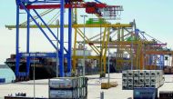 Cranes remain idle during the first day of a nationwide intermittent strike of dockers against a planned port reform in line with European Union laws, in the port of Valencia, Spain, yesterday.
