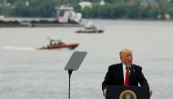U.S. President Donald Trump announces his $1 trillion infrastructure plan to the crowd during a rally alongside the Ohio River at the Rivertowne Marina in Cincinnati, Ohio, U.S. June 7, 2017. REUTERS/John Sommers II