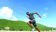 Usain Bolt of Jamaica trains at the University of West Indies in Kingston on Thursday.
