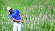 Dustin Johnson of the United States plays his shot during a practice round prior to the 2017 US Open at Erin Hills in Hartford, Wisconsin 