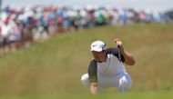 Paul Casey of England lines up a putt on the ninth green during the second round of the 2017 U.S. Open at Erin Hills on June 16, 2017 in Hartford, Wisconsin. Streeter Lecka/AFP

